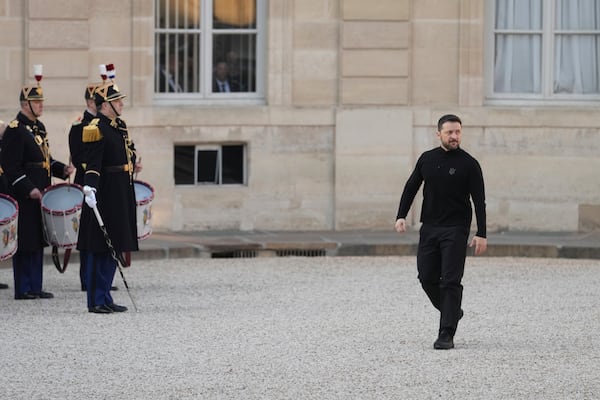 Ukrainian President Volodymyr Zelenskyy arrives before his meeting with French President Emmanuel Macron to prepare Thursday's gathering of the so-called "coalition of the willing" nations that are allies of Ukraine, Wednesday, March 26, 2025 at the Elysee Palace in Paris. (AP Photo/Thibault Camus)