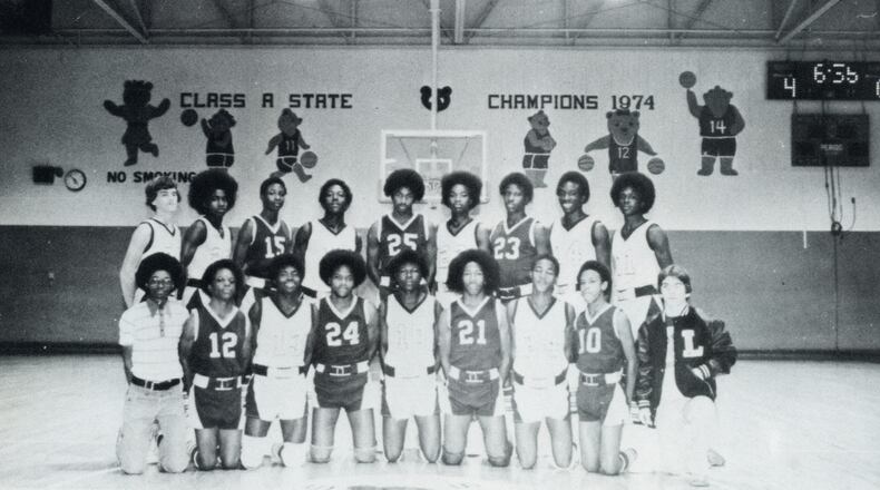 Mississippi’s Leland High School basketball team in the 1979 yearbook. Douglas Blackmon is far left on the back row. Blackmon's documentary, "The Harvest," depicts the integration of Leland's schools.
