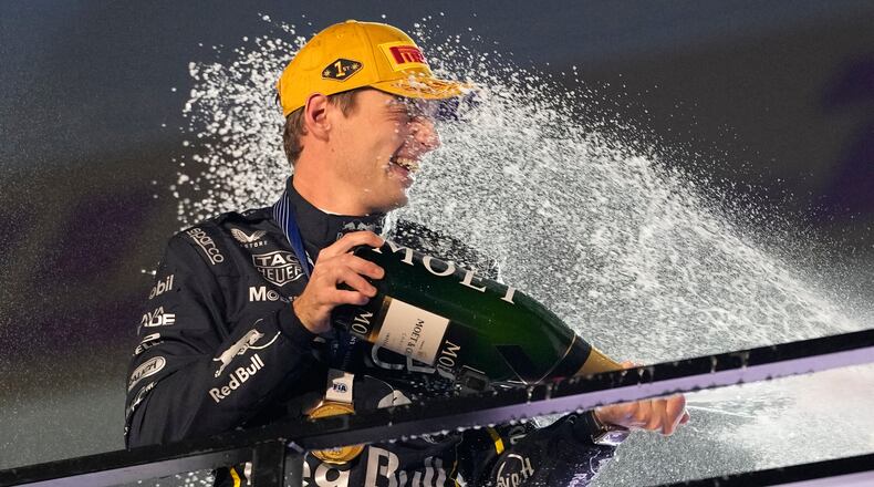 First place finisher Red Bull driver Max Verstappen of the Netherlands celebrates after the Formula One Las Vegas Grand Prix auto race, Saturday, Nov. 22, 2025 in Las Vegas. (AP Photo/John Locher)