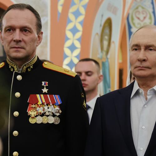 Russian President Vladimir Putin, right, accompanied by military personnel and their families, attends an Orthodox Christmas service at a church in Moscow Region, Russia, on Wednesday, Jan. 7, 2026. (Vyacheslav Prokofyev, Sputnik, Kremlin Pool Photo via AP)