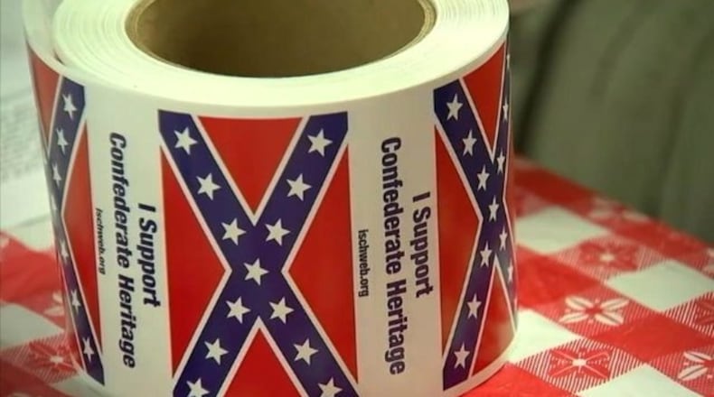 Confederate flag stickers have been given away for 25 years. (Photo: WSOCTV.com)