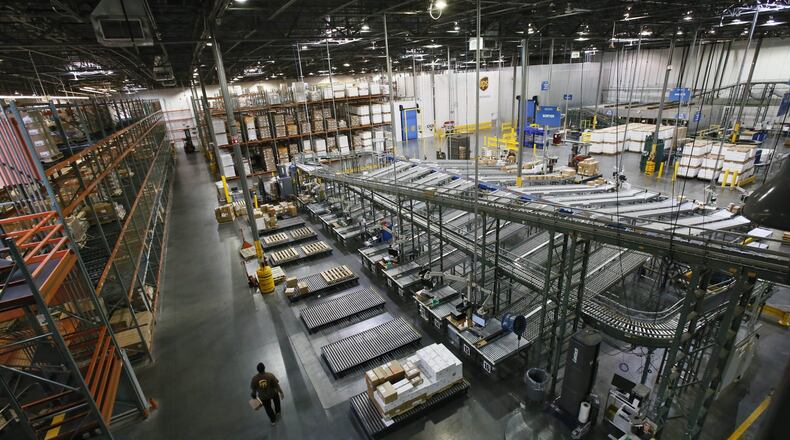 Sept. 19, 2014 - Suwanee - Overview of the Suwanee facility. UPS does logistics for health care companies at its facility in Suwanee, and other companies , including Pratt & Whitney, at its distribution center near Hartsfield Jackson International Airport. Sandy Springs-based UPS, Atlanta-based Manhattan Associates and other local companies play leading roles in the logistics industry. BOB ANDRES / BANDRES@AJC.COM