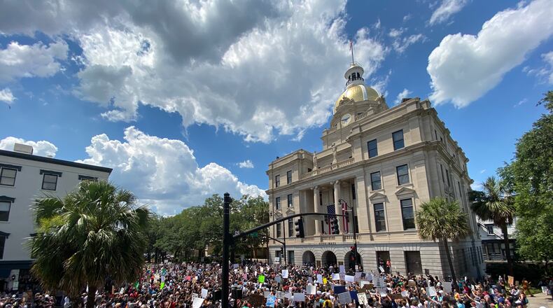 Hundreds made their way Sunday afternoon through downtown Savannah to honor George Floyd.