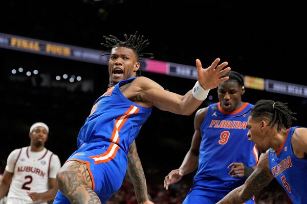 Florida guard Alijah Martin celebrates after scoring against Auburn during the second half in the national semifinals at the Final Four of the NCAA college basketball tournament, Saturday, April 5, 2025, in San Antonio. (AP Photo/Brynn Anderson)