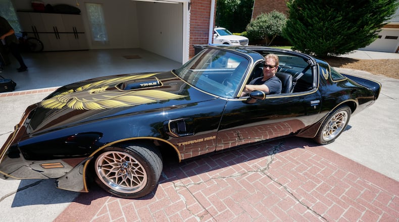 Musician Joe Gransden is seen parking his newly restored 1979 Pontiac Trans-Am at his house’s garage on Tuesday, July 2, 2024. After searching for it for ten years, Joe Gransden reclaimed his Trans Am from the restorer.
(Miguel Martinez / AJC)