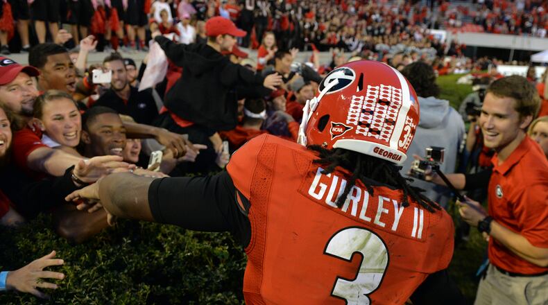 October 4,2014 Athens, GA: Suspended Georgia Todd Gurley celebrates the win over Vanderbilt at Sanford Stadium in Athens Saturday October 4, 2014. BRANT SANDERLIN / BSANDERLIN@AJC.COM If the Vanderbilt game was Todd Gurley's exit from UGA, the Dogs must improve in other areas. (Brant Sanders/AJC)