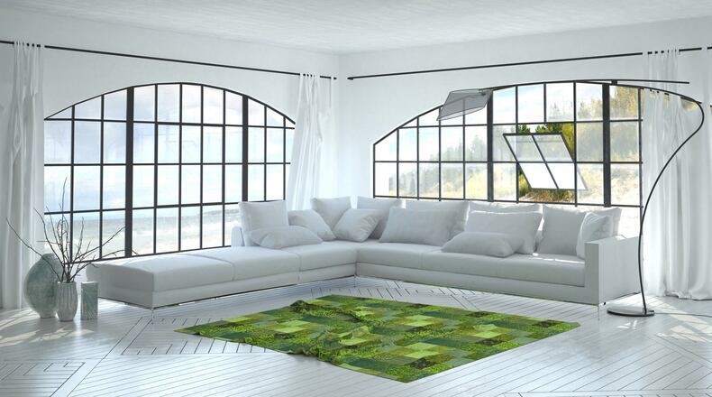 Often, a rug is the largest design element in the room contributing color and drama to the overall feel of a space. (Dreamstime)