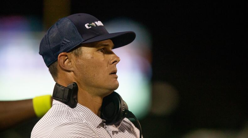 Grayson head coach Adam Carter watches the field during a GHSA high school football game between Grayson High School and Archer High School at Grayson High School in Loganville, GA., on Friday, Sept. 10, 2021. (Photo/Jenn Finch)