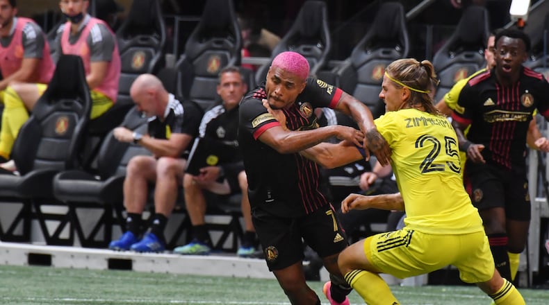 August 28, 2021 Atlanta - Atlanta United's forward Josef Martinez (7) works the ball against Nashville SC's defender Walker Zimmerman (25) during the first half in a MLS soccer match at at Mercedes-Benz Stadium in Atlanta on Saturday, August 28, 2021. (Hyosub Shin / Hyosub.Shin@ajc.com)