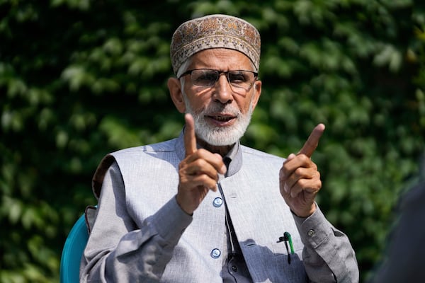 Kashmiri poet Zareef Ahmed Zareef talks to the Associated press in Srinagar, Indian controlled Kashmir, Tuesday, May 6, 2025. (AP Photo/Mukhtar Khan)