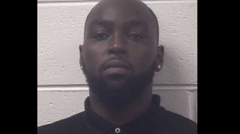 Malon B. Neal, 24, was charged with speeding, reckless driving and using wireless communications while driving.