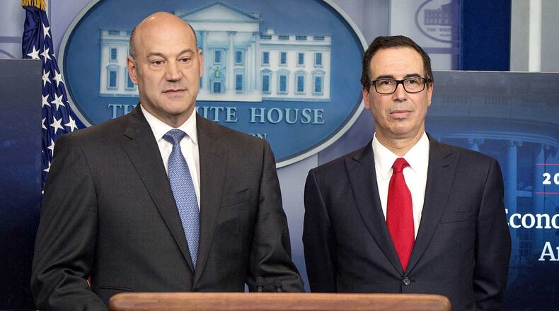 Trump economic adviser Gary Cohn, left, and Treasury Secretary Steve Mnuchin are both former executives with Goldman Sachs, and together are heading up the Trump administration's supposedly "populist" tax reform plan. (AP)