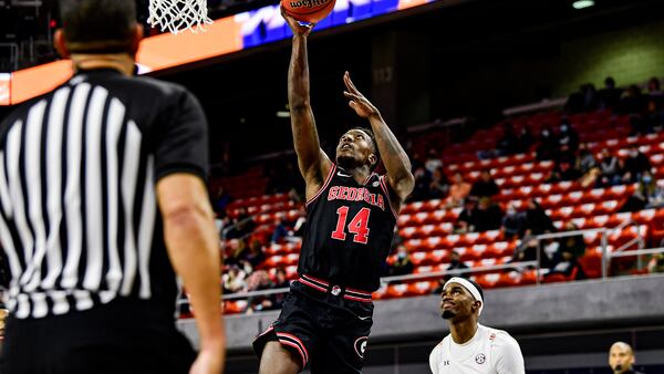 Bulldogs guard Tye Fagan (14) goes up for a shot against Sunday, Jan. 31, 2021, against the Tigers at the Auburn Arena, in Auburn, Ala. (Todd Van Emst/AU Athletics)