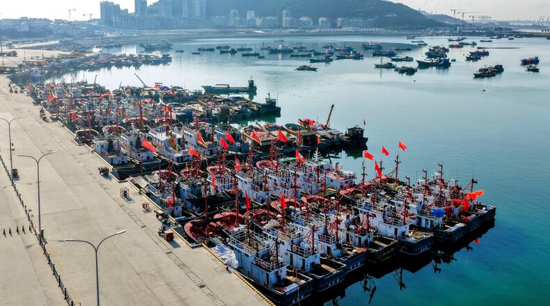 In this aerial photo released by Xinhua News Agency, fishing boats shelter at a port ahead of Typhoon Dolphin in Lianyungang, eastern China's Jiangsu Province on Aug. 7, 2026. (Wang Jianmin/Xinhua via AP)