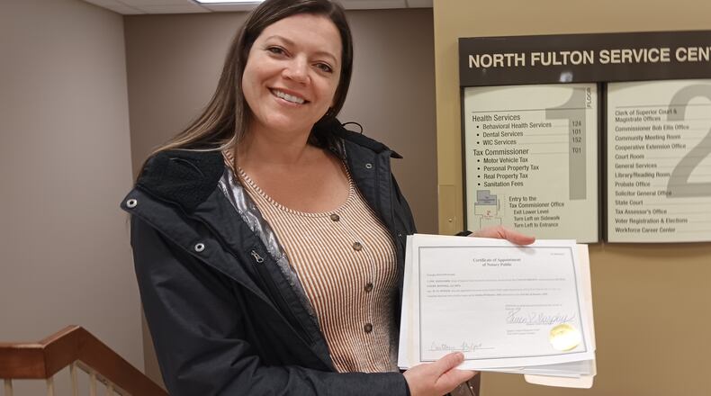 Caitlin Philpot got her notary public commission Feb. 1, 2024, on her third try. The Roswell resident had to come back to Fulton County offices due to effects of a weekend cyberattack.