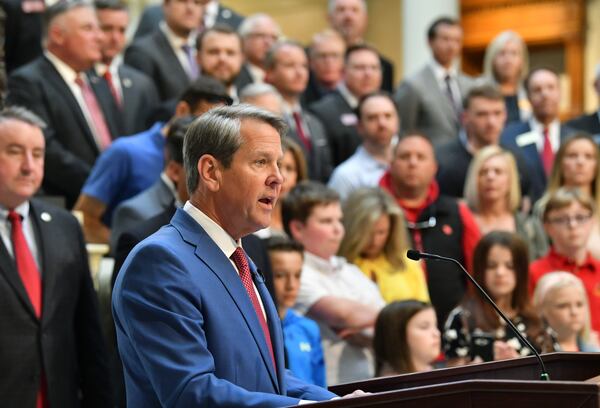 Gov. Brian Kemp speaks before he signs legislation that allows parents who don’t want their children wearing masks to opt out of any school district mandates at the Georgia State Capitol on Tuesday, March 29, 2022. Gov. Brian Kemp on Tuesday  (Hyosub Shin / Hyosub.Shin@ajc.com)