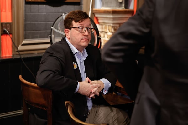 Joshua McKoon chairman of the Georgia Republican Party attends a reelection night watch party for incumbent Republican Public Service Commissioner Fitz Johnson at Olde Blind Dog Irish Pub in Milton on Tuesday, Nov. 4, 2025. (Natrice Mille/AJC)