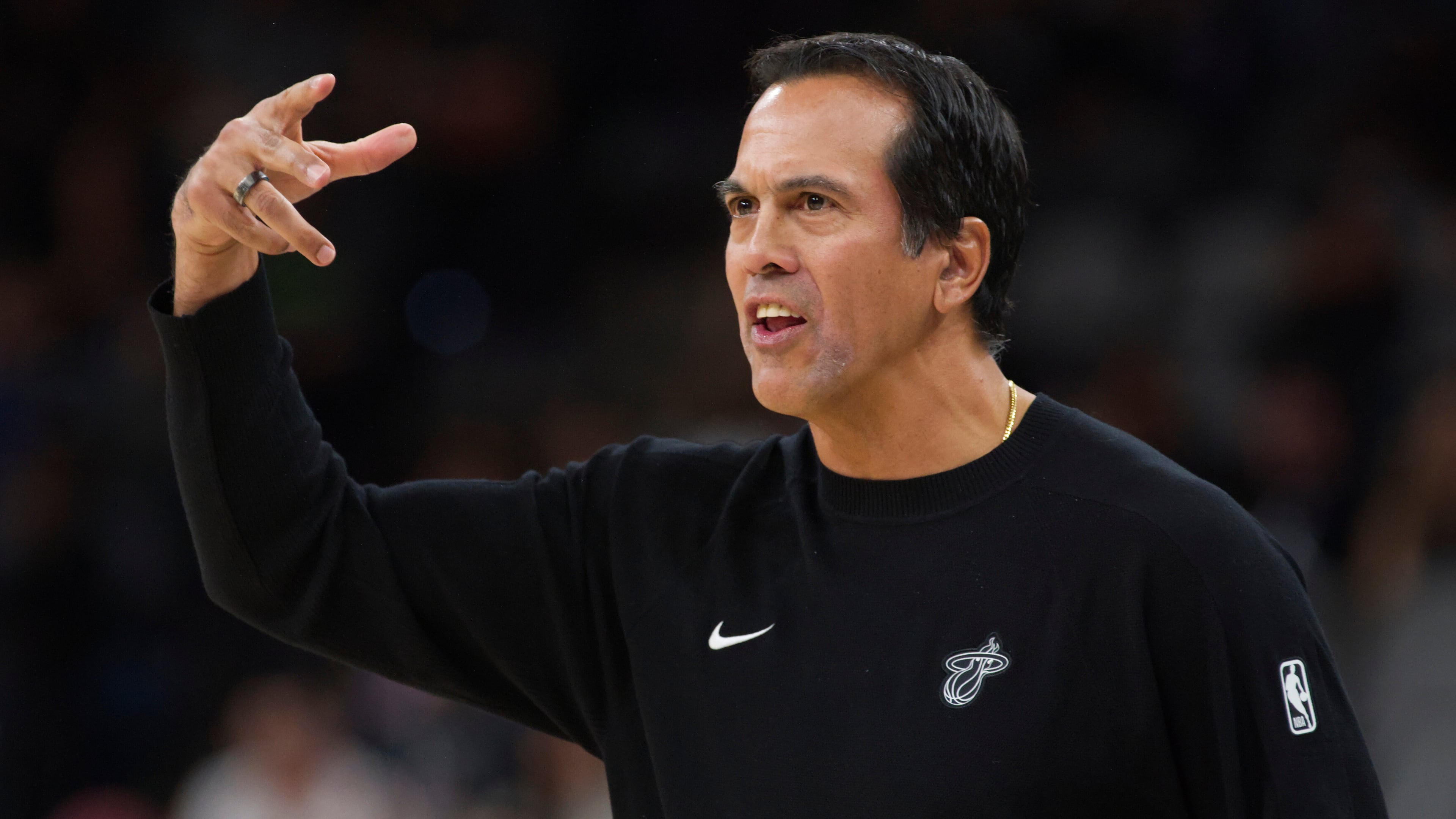 Miami Heat head coach Erik Spoelstra yells to his players during the first half of an NBA basketball game against the San Antonio Spurs, Thursday, Oct. 30, 2025, in San Antonio. (AP Photo/Darren Abate)