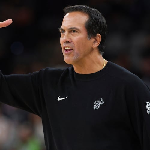 Miami Heat head coach Erik Spoelstra yells to his players during the first half of an NBA basketball game against the San Antonio Spurs, Thursday, Oct. 30, 2025, in San Antonio. (AP Photo/Darren Abate)