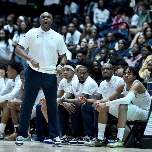 Coach Larry Thompson — pictured shouting instructions during the Class 6A championship game in March — and defending state champion Wheeler remain No. 1 in the 6A standings this season. The Wildcats are No. 16 in MaxPreps’ national rankings. (Hyosub Shin/AJC 2025)
