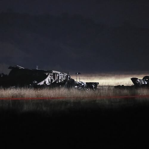 Debris is seen at a crash site of a Turkish military cargo plane in Georgia's Sighnaghi municipality, close to the Azerbaijani border on Wednesday, Nov. 12, 2025. (AP Photo/Zurab Tsertsvadze)