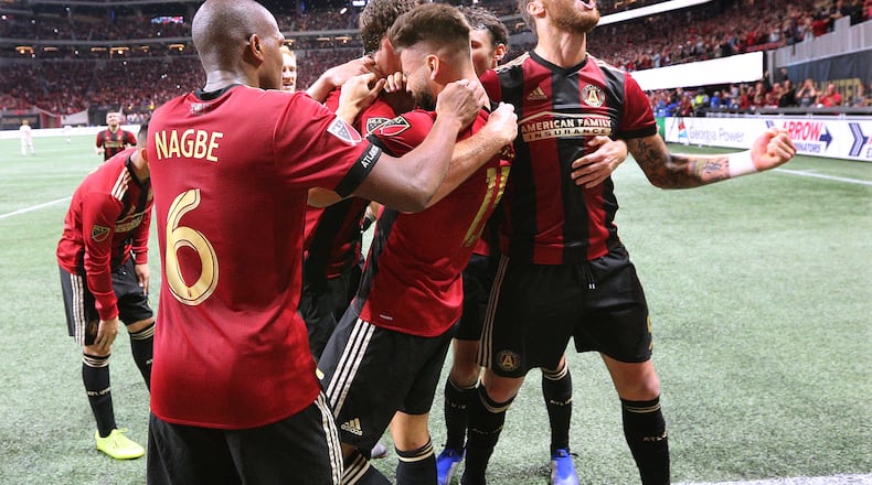 Nov 25, 2018 Atlanta: Atlanta United players mob Hector Villaiba after his goal for a 3-0 victory over the New York Red Bulls during the second half in their Eastern Conference finals MLS soccer game on Sunday, Nov. 25, 2018, in Atlanta. Curtis Compton/ccompton@ajc.com