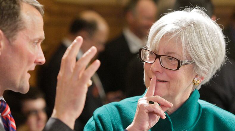 Scott Austensen, CFO at the Georgia Department of Education (left) speaks with Rep. Kathy Ashe after his budget presentation.