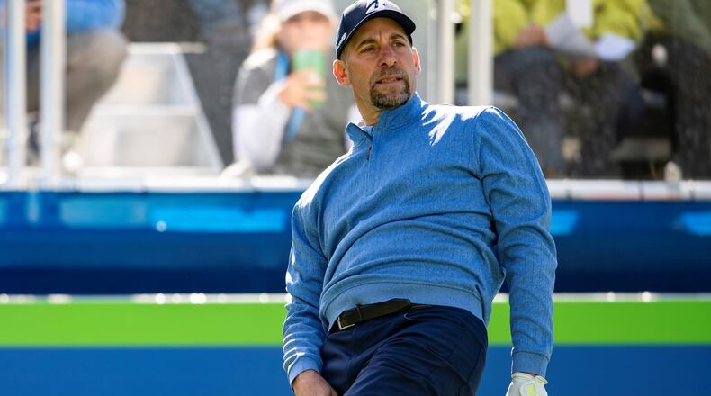 John Smoltz reacts to a wayward shot Sunday.