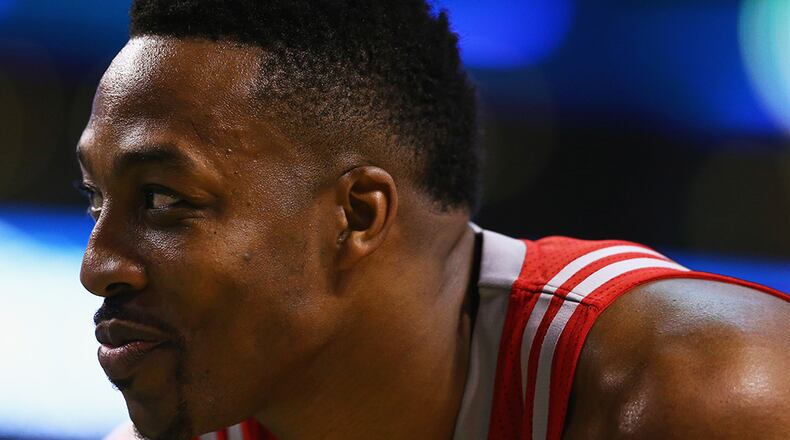 Dwight Howard agreed to a three-year, free agency deal to play with his hometown Atlanta Hawks.