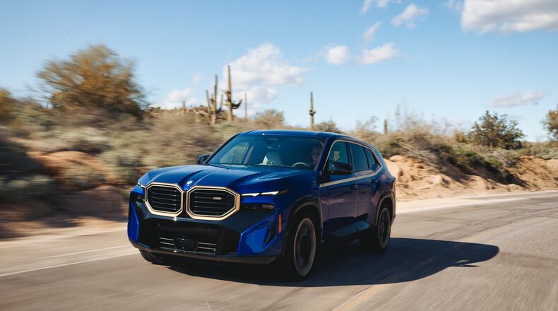The BMW XM is a plug-in hybrid SUV with exhilarating performance. (BMW)