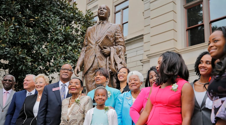 8/26/17 - Atlanta, GA - Georgia leaders, including Gov. Nathan Deal, Sandra Deal, members of the King family, and Rep. Calvin Smyre, were on hand for unveiling of the first statue of Martin Luther King Jr. on Monday at the statehouse grounds, more than three years after Gov. Nathan Deal first announced the project. During the hour-long ceremony leading to the unveiling of the statue of Martin Luther King Jr. at the state Capitol on Monday, many speakers, including Gov. Nathan Deal, spoke of King's biography. The statue was unveiled on the anniversary of King's famed "I Have Dream" speech. BOB ANDRES /BANDRES@AJC.COM