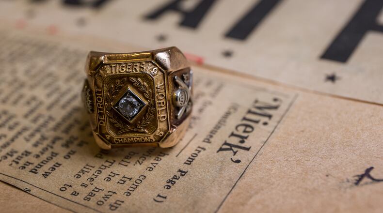 Ed Mierkowicz's 1945 World Series championship ring rests on an old newspaper article about him.
