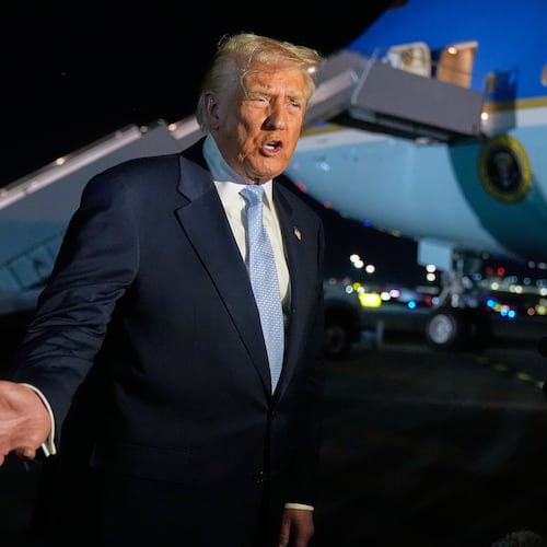 President Donald Trump speaks to reporters before boarding Air Force One at Palm Beach International Airport in West Palm Beach Fla., on his way back to the White House, Sunday, Nov. 16, 2025. (AP Photo/Manuel Balce Ceneta)