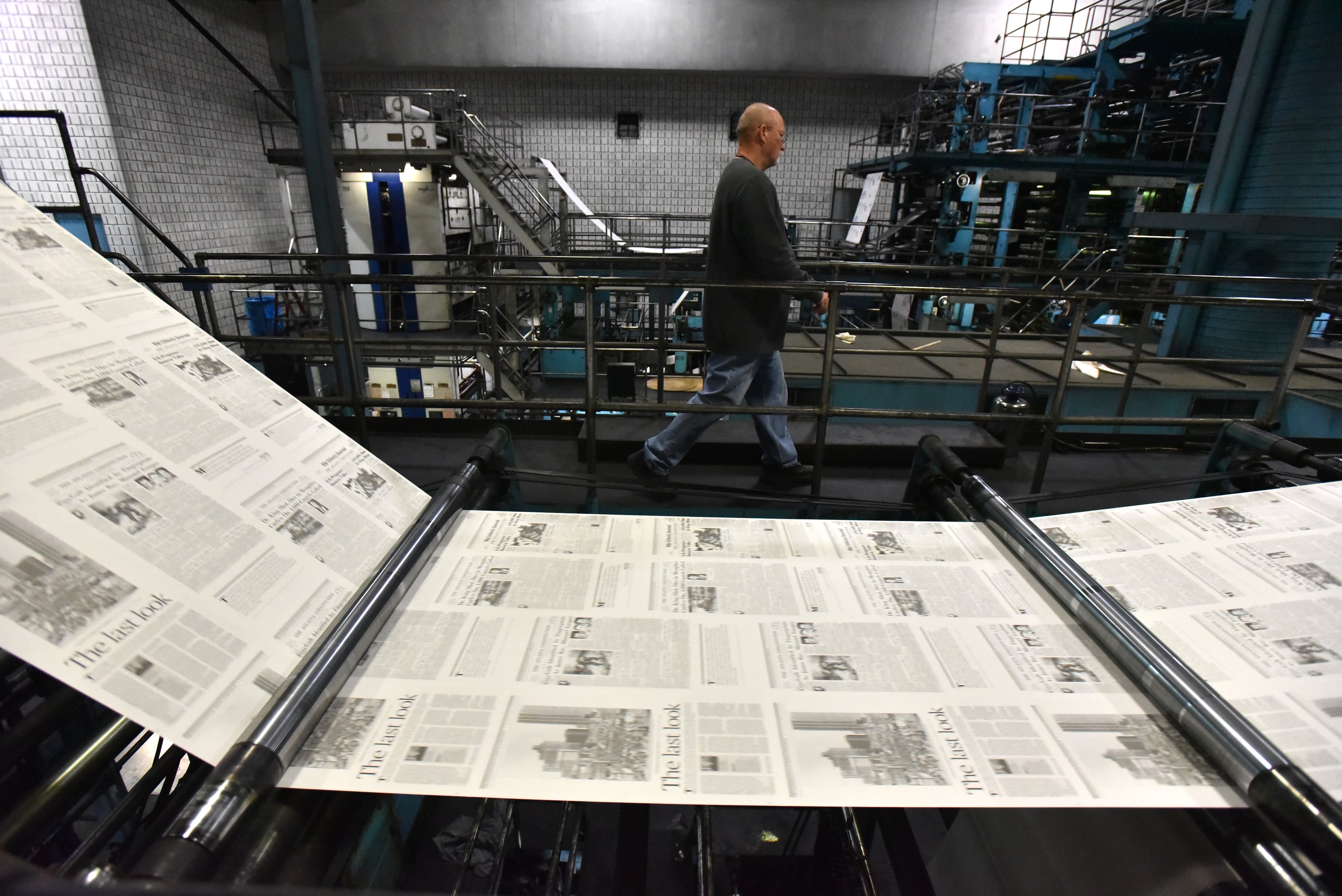 A special section rolls out at The Atlanta Journal-Constitution's printing plant on Saturday, March 17, 2018, in Norcross. Beginning on Jan. 1, this 157-year-old institution will become a fully digital news operation. (Hyosub Shin/AJC)