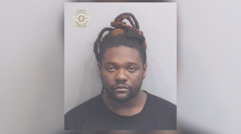 Chad Okelley, 28, was arrested and faces a murder charge in the January shooting death of Anthony Hopgood in East Point. (Credit: Fulton County Sheriff's Office)