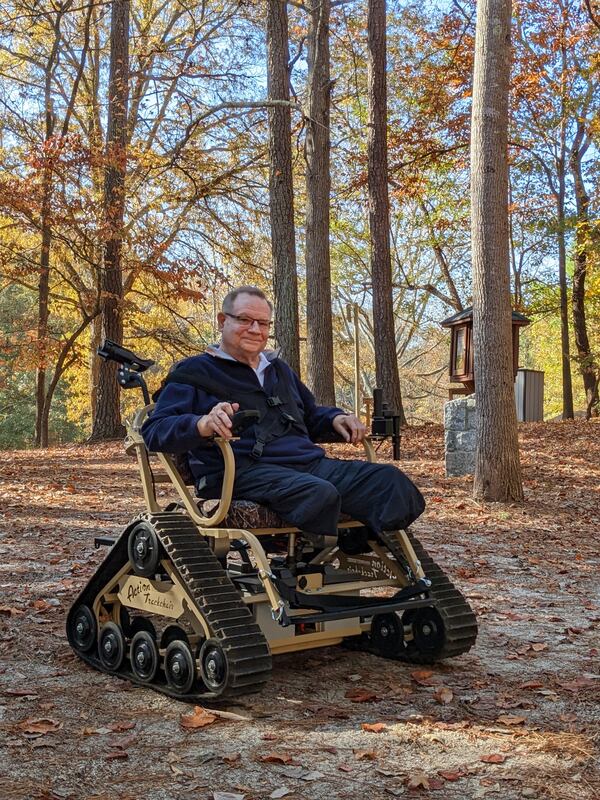 Andy Fleming, 72, uses one of the all-terrain wheelchairs available to guests at 20 Georgia State Parks. (Courtesy of Georgia State Parks)