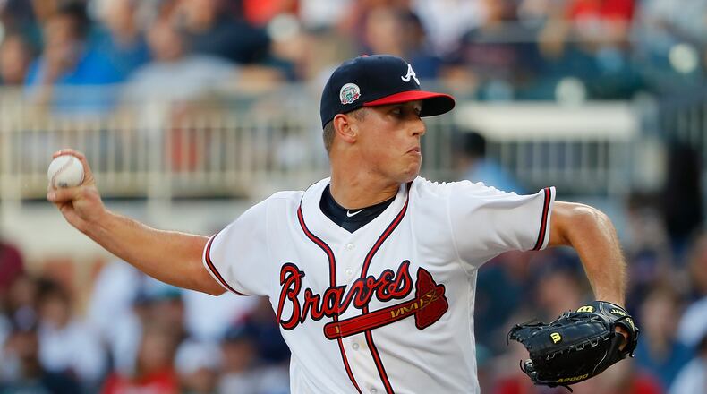ATLANTA, GA - AUGUST 01: Lucas Sims #50 of the Atlanta Braves makes his MLB debut as he pitches in the first inning against the Los Angeles Dodgers at SunTrust Park on August 1, 2017 in Atlanta, Georgia. (Photo by Kevin C. Cox/Getty Images)