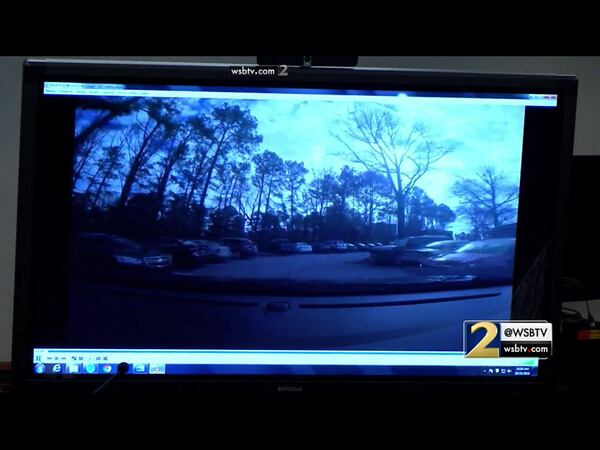 In this GoPro camera video, Cobb County lead detective Phil Stoddard demonstrates the route taken by Justin Ross Harris on the day that Cooper died. In this view, the vehicle arrives at the Home Depot Treehouse parking lot, roughly where Ross Harris parked on the morning of Cooper's death. The video was shown to the jury during murder trial of Justin Ross Harris at the Glynn County Courthouse in Brunswick, Ga., on Monday, Oct. 24, 2016. (screen capture via WSB-TV)