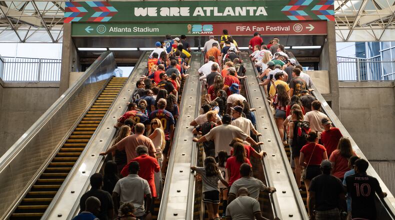 Fans exit the SEC District MARTA station to attend the first FIFA match in Atlanta on Monday, June 15, 2026. (Ben Hendren for the AJC)