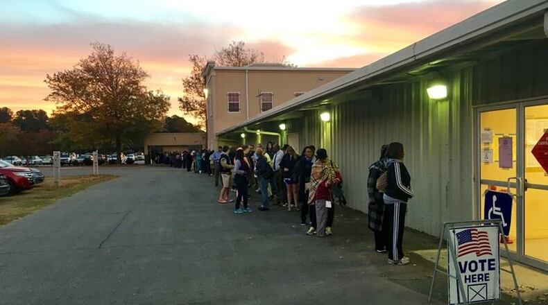 More than 100 people were lined up to vote at the Gwinnett County Fairgrounds in Lawrenceville before polls opened at 7 a.m. CONTRIBUTED AJC FILE PHOTO