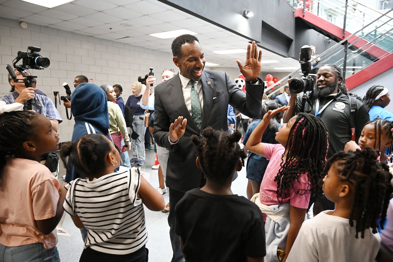 Atlanta Mayor Andre Dickens is greeted by camp participants as he tours the FIFA World Cup 2026 pep rally at the city’s youth summer camps, “One World, One Goal,” at the C.T. Martin Natatorium and Recreation Center on Tuesday, June 9, 2026, in Atlanta. (Hyosub Shin/AJC)