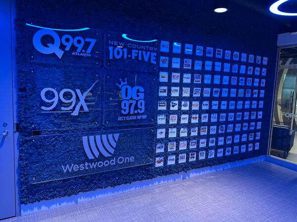 Cumulus Media in Atlanta owns more than 400 stations nationwide including four in Atlanta: Q99.7, 99X, New Country 101.5 and OG 97.9. This is the hallway entrance into Cumulus Atlanta. (Rodney Ho/AJC) 