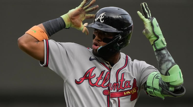Braves right fielder Ronald Acuña Jr. reacts as he round third base after hitting a solo home run during the first inning against the Reds on Friday, May 29, 2026, in Cincinnati. Acuña added another homer in the ninth inning. (Carolyn Kaster/AP)