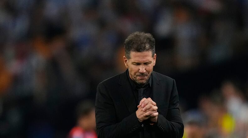 Atletico Madrid's head coach Diego Simeone reacts during the Copa del Rey final soccer match between Atletico Madrid and Real Sociedad in Seville, Spain, Saturday, April. 18, 2026. (AP Photo/Jose Breton)