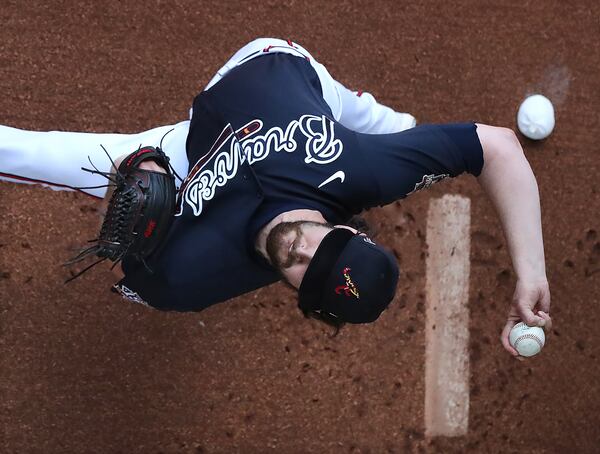 Braves pitcher Ian Anderson gets loose throwing in the bullpen before a spring training game at CoolToday Park on Tuesday, March 2, 2021.   Curtis Compton / Curtis.Compton@ajc.com