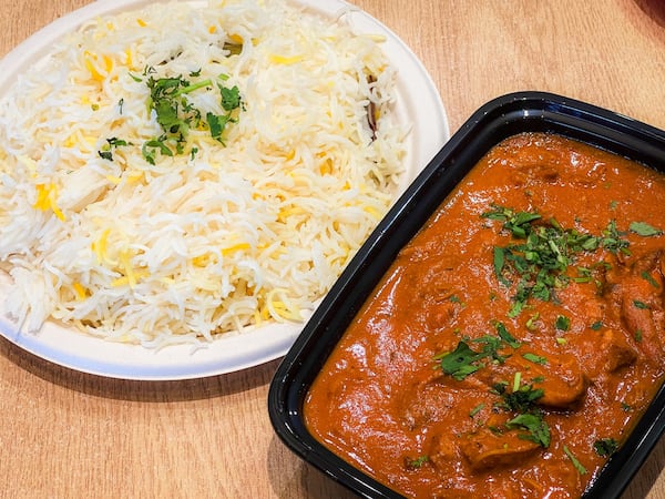 Zyka, with locations in Decatur and Alpharetta, serves a wonderful version of butter chicken that is emblematic of the appeal of Indian food. (Henri Hollis/AJC)