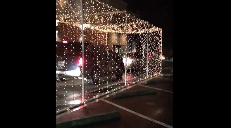 A Marietta Chick-fil-A is giving its drive-through customers a musical holiday light show. This was the display last year at the Chick-fil-A's drive-through.