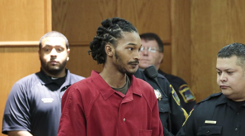NOV. 29, 2016 — Johnthony Walker is escorted into a courtroom at the Hamilton County Justice Center on Tuesday in Chattanooga, Tenn. Walker, the driver accused in the Chattanooga school bus crash that killed six children last week, appeared in court, but his preliminary hearing on vehicular homicide charges was postponed until Dec. 15. (Dan Henry/Chattanooga Times Free Press via AP)