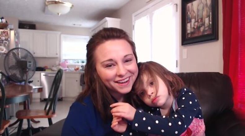 Liz Santa Cruz of Flowery-Branch was one of two single parents in the metro area recognized by Georgia-Pacific for Single Parent's Day on March 21.