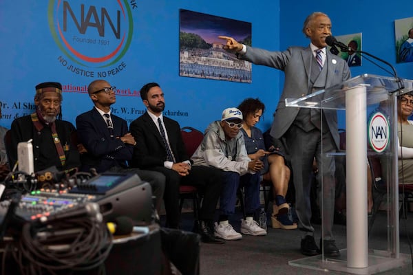 Rev. Al Sharpton, right, speaks during the National Action Network's Saturday action rally at House of Justice in Harlem, Saturday, June 28, 2025, in New York. (AP Photo/Yuki Iwamura)